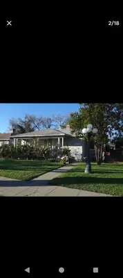 a house with a street light in front of it at Ping's Tiny Home self-check in & out private in Merced