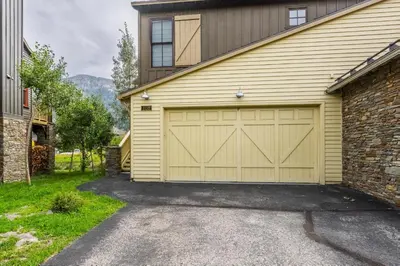a garage door on a house with a driveway at Lodges 1156 in Mammoth Lakes