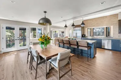 a kitchen and dining room with a table and chairs at Luxury Tahoe Vacation Rental with HotTub & Lake Views in Tahoe Vista