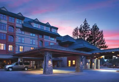 a hotel with a car parked in front of it at Marriott Timber Lodge 2BD Villa in Stateline