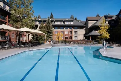 a large swimming pool in front of a building at Marriott Timber Lodge 2BD Villa in Stateline