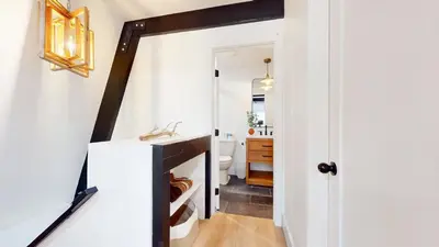 a bathroom with a mirror and a sink at Bigwood #96 condo in Mammoth Lakes