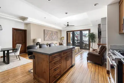a kitchen with a large island in a living room at Luxury 4BDR Residence steps from Heavenly Village condo in South Lake Tahoe