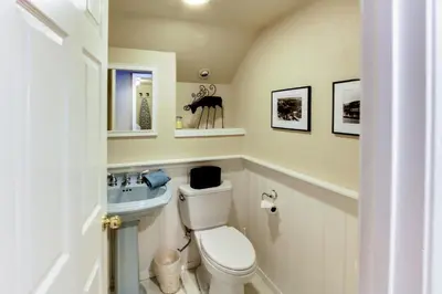 a bathroom with a toilet and a sink at The Gathering Place in Truckee