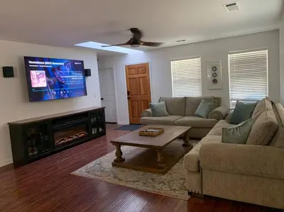 a living room with a couch and a fireplace at Walnut Grove 2BD 1Bath in Oakhurst