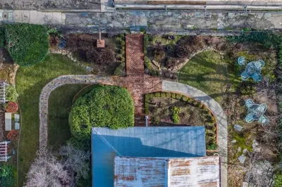an overhead view of a garden with a pool at Romantic Victorian Getaway The Fox in Sutter Creek