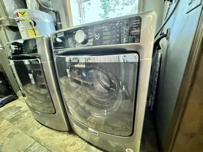 a washer and dryer sitting in a kitchen at Cozy Tahoe Retreat Huge Yard in South Lake Tahoe