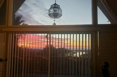 a window with a view of the ocean from a house at Lakeview Dome in La Grange