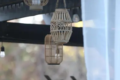 a group of lights hanging from a porch at Chic Boho 3BR Home Near Woodward Park in Fresno