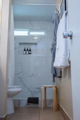 a bathroom with a toilet and a sink at Beautiful Condo by Park Entrance in Three Rivers