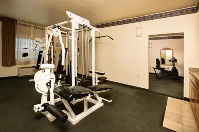 a fitness room with a gym with a treadmill at Gold Dust West in Carson City