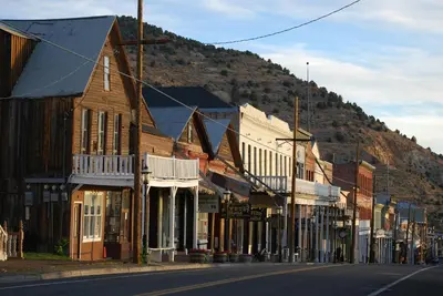 a street in an old town with a mountain at Gold Dust West in Carson City