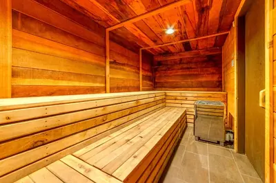 an empty wooden sauna with a bench in it at Walk to Ski Lift Mtn-View Condo in Mammoth Lakes in Mammoth Lakes