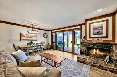 a living room with a couch and a fireplace at TML 04 - Beautiful 1 BR Condo in Tahoe City in Tahoe City