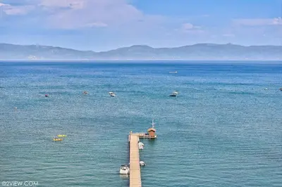 a dock in the middle of a large body of water at TML 04 - Beautiful 1 BR Condo in Tahoe City in Tahoe City