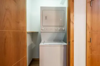 a washer and dryer in a small room at Solstice 17 in Mammoth Lakes