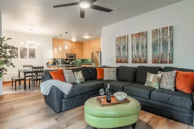 a living room with a couch and a table at Solstice 17 in Mammoth Lakes