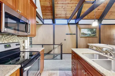 a kitchen with a sink and a stove at Tahoe Tranquility in Incline Village