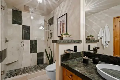 a bathroom with a sink and a toilet and a shower at Third Creek- Experience the Ultimate in Luxury in Incline Village