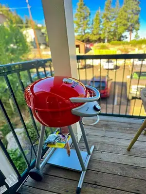 a red chair sitting on a porch with at Mountain Serenity, near Ski, Golf, Casino, Lake in Stateline