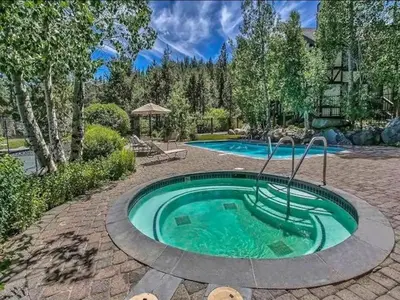 a small swimming pool in a brick yard with at 2 Miles to Palisades Ski Resort w Free Shuttle! in Olympic Valley