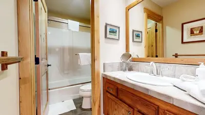 a bathroom with a sink and a shower and a toilet at Snowcreek I #47 condo in Mammoth Lakes