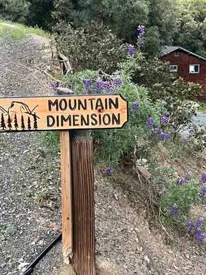 a sign that reads mountain diversion on a hill at Mountain Dimension in Ponderosa Basin