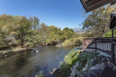 a view of a river from a house at Sequoia Riverfront House with Private Beach in Three Rivers