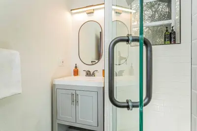 a bathroom with a sink and a shower at Sequoia TREE HOUSE light andbright in Three Rivers