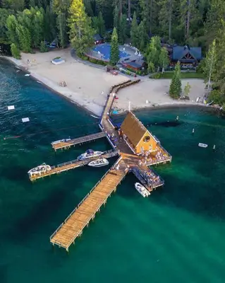 an aerial view of a dock in the water at Cozy Palisades Tahoe Ski Cabin 3BR 3BA Free Shuttle to Lifts Book on Mobile for Promo Price in Alpine Meadows