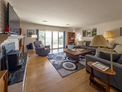 a living room with a couch and a tv at Yosemite Mountain Top Retreat Hilltop Manor Pool Spa in Mariposa