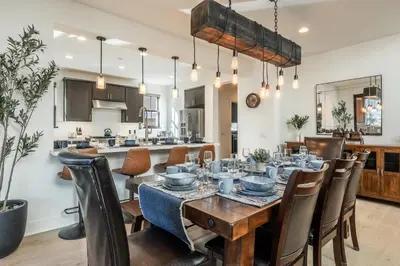 a dining room with a table and chairs at Creekhouse 1374 in Mammoth Lakes