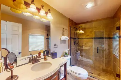 a bathroom with a sink and a shower and a toilet at Morgan Hill Couples Gem Villa in the Vineyards in Morgan Hill