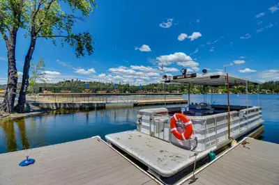 a boat is docked at a dock in the water at Green Abode in Groveland