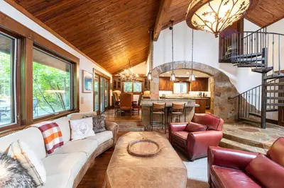 a living room with a couch and a table at Serenity at Dollar Point - Luxurious 4BR w Private Backyard in Tahoe City