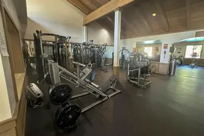 a gym with a bunch of equipment in a room at Gold Bend Getaway in Truckee