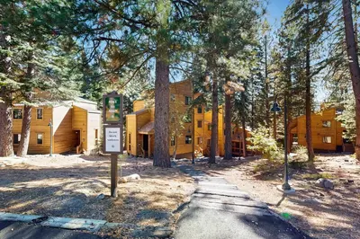 a yellow building with a sign in front of it at Gold Bend Getaway in Truckee