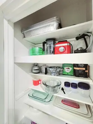 a kitchen pantry filled with lots of kitchen items at Tahoe Shoreline Retreat - Close to Ski Resorts & HOA Amenities in Tahoe Vista