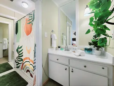 a bathroom with a sink and a mirror at Tahoe Shoreline Retreat - Close to Ski Resorts & HOA Amenities in Tahoe Vista