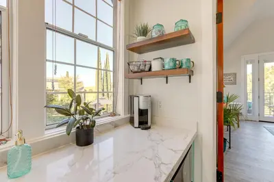 a kitchen with a counter with a coffee maker at Steps to Sutter Creek Chic Wine Country Cottage in Sutter Creek