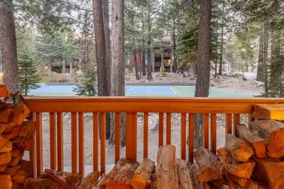 a view of a tennis court from a deck at Summit #269 - 2 Bedrm 2 Bathrm Condo - Walk To Eagle Lodge Lifts in Mammoth Lakes