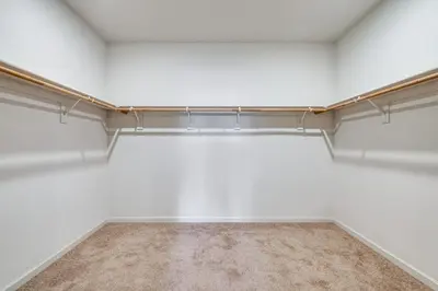 an empty room with white walls and a shelf at WFH-Friendly Getaway with Yard in Manteca! in Manteca