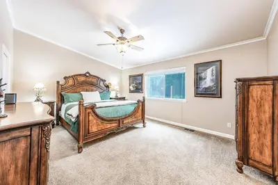 a bedroom with a bed and a ceiling fan at Eagle Retreat Mountain Escape New With AC in Shaver Lake