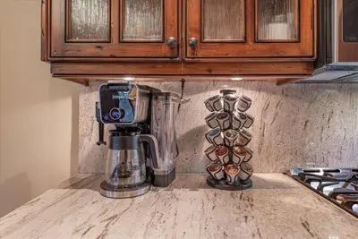a kitchen counter with a coffee maker and a blender at Luxury 3 BDR Northstar Condo in Truckee