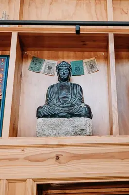 a statue of a woman sitting in a box at Oak Meadows House - A unique home near Yosemite in Mariposa