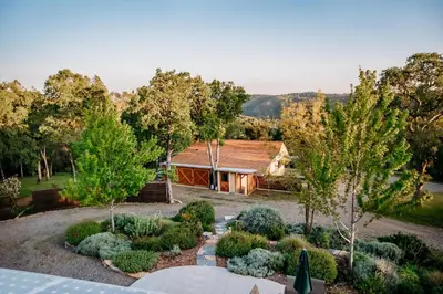 an aerial view of a garden in front of a house at Romantic Yosemite Retreat - Private Zen Hot Tub in Mariposa