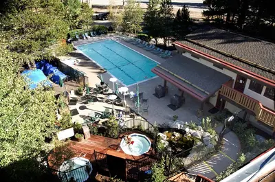 an overhead view of a swimming pool with a pool at GetAways at Olympic Village Inn in Olympic Valley