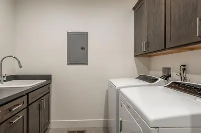 a kitchen with a sink and a dishwasher at Newly Built Townhome in Snowcreek Creekhouse #1324 Three Bed Three Baths Sleeps 8! Mountain Views! in Mammoth Lakes
