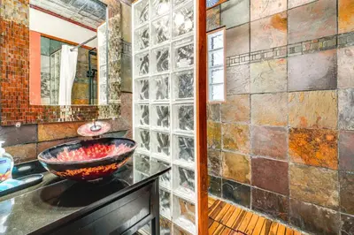 a bathroom with a sink and a bowl on a counter at Shuttle to Slopes Northstar Gem with Hot Tub Access in Truckee