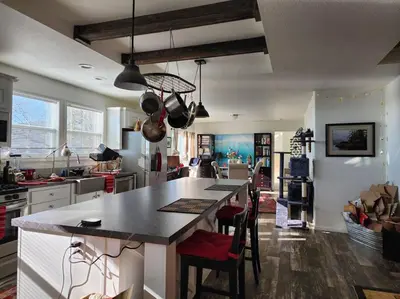 a kitchen with a island in the middle of a room at Majestic View in Mariposa